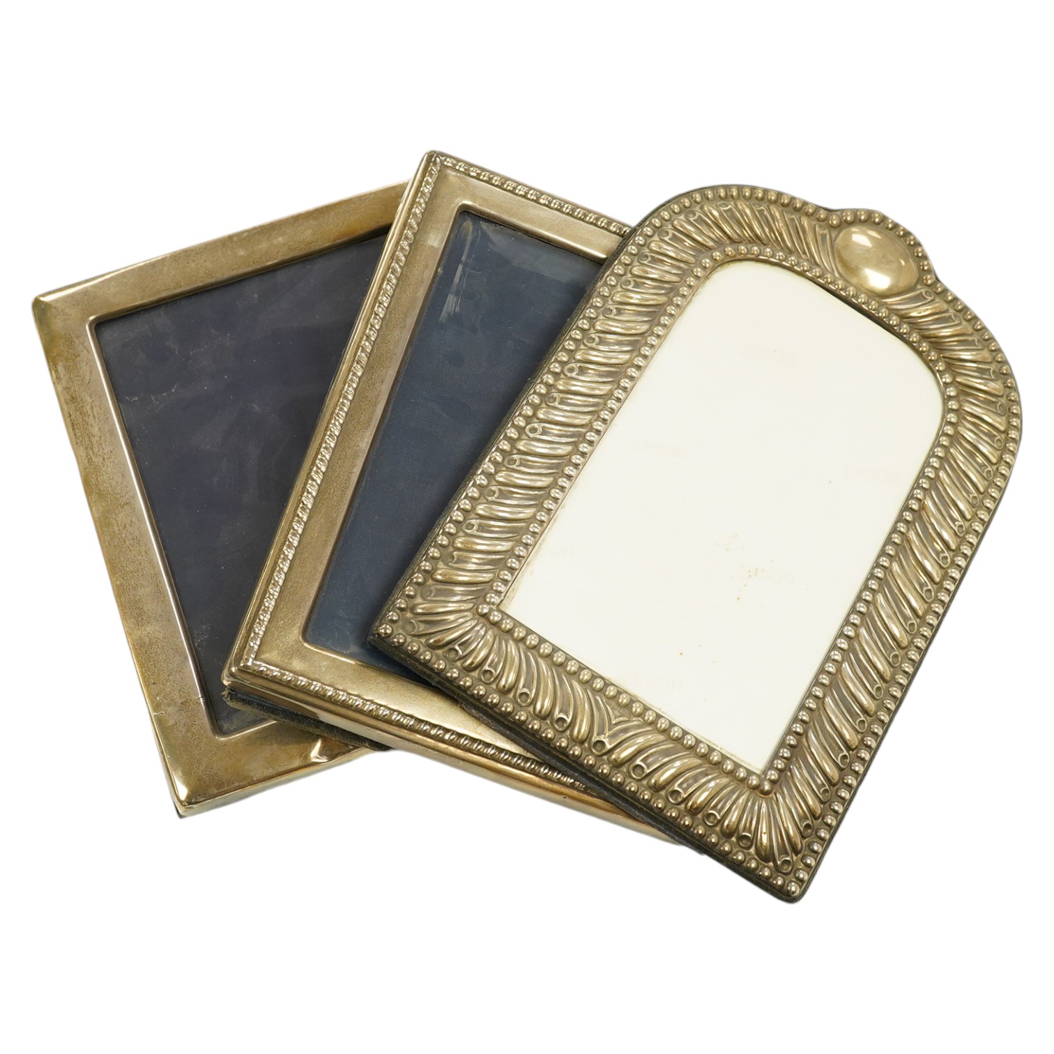 Three assorted modern silver mounted photograph frames, largest 26cm. Condition - fair to good